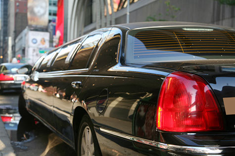 Columbia SC Lincoln Town Car Stretch Limousine drives through the streets with clients for their special occasion.